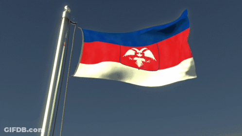 A Red White And Blue Flag With An Eagle On It Is Flying In The Wind GIF