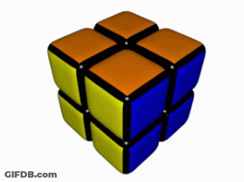 A Red White And Yellow Rubik 'S Cube On A White Surface GIF