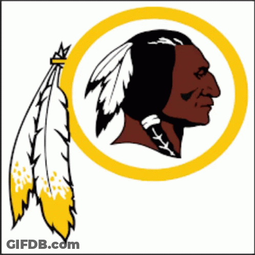 A Redskins Logo With A Feather In His Hair And A Yellow Smiley Face GIF