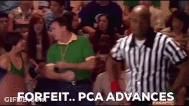A Referee Is Standing In Front Of A Crowd Of People And Says `` Forfeit Pca Advances '' . GIF