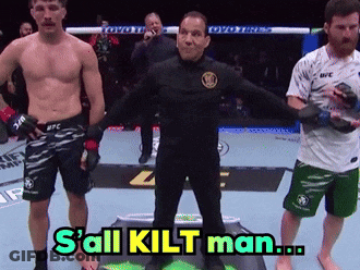 A Referee Stands Between Two Fighters And Says S All Kilt Man GIF