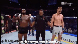A Referee Stands Between Two Men In A Boxing Match And Says Derrick Owns You Fraudkov GIF
