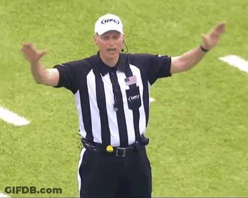 A Referee Wearing A Striped Shirt And A White Hat With The Word Ufl On It GIF