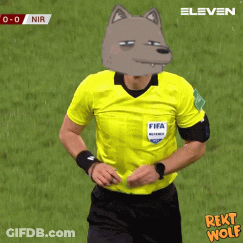 A Referee Wearing A Yellow Shirt With Fifa On The Front GIF