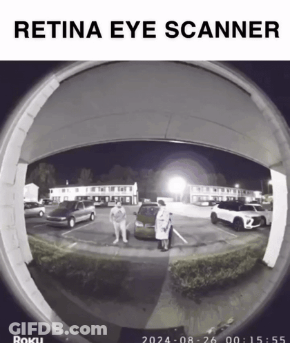 A Retina Eye Scanner Shows A Couple Standing In A Parking Lot At Night GIF