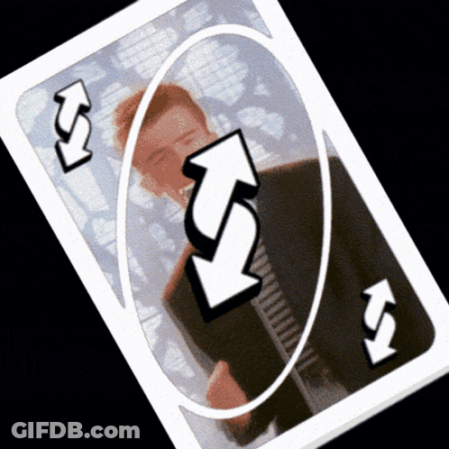 A Reverse Uno Card With A Man In A Suit And Tie GIF