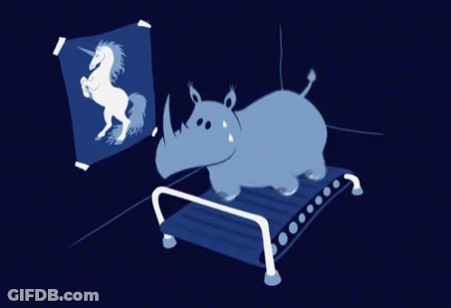 A Rhino Is Running On A Treadmill In Front Of A Unicorn Poster GIF