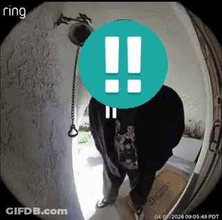 A Ring Camera Shows A Man Standing In Front Of A Door With An Exclamation Point On His Face GIF