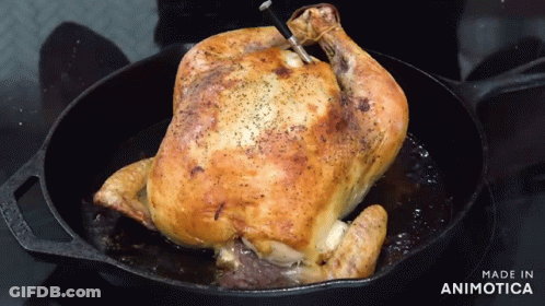 A Roasted Chicken Is Being Cooked In A Cast Iron Skillet With The Words Made In Animotica Below It GIF