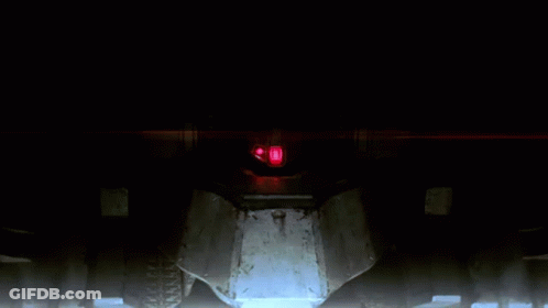 A Robot Has A Red Light On Its Head GIF