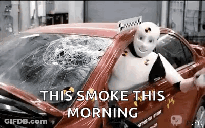 A Robot Is Sitting In A Car With A Broken Windshield And The Words `` This Smoke This Morning '' . GIF