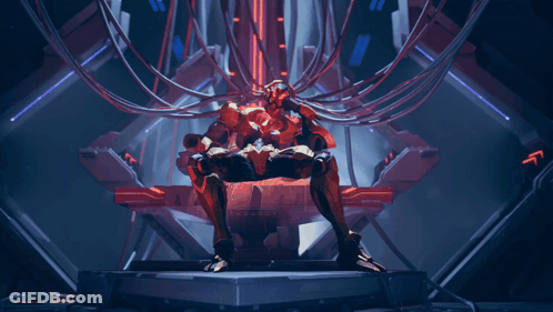 A Robot Is Sitting On A Throne With A Bunch Of Wires Around It GIF