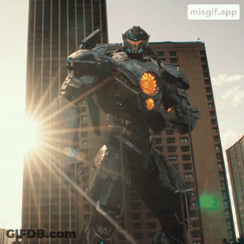 A Robot Is Standing In Front Of A Building With The App Misgif.app Visible In The Corner GIF