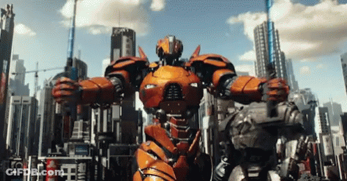 A Robot Is Standing In Front Of A City With A Sign That Says ' Emperor ' On It GIF