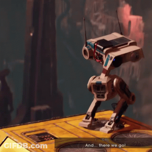 A Robot Is Standing In Front Of A Mountain With A Cliff In The Background GIF