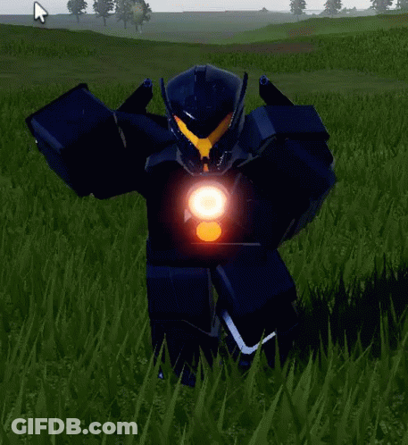 A Robot Is Standing In The Grass In A Field With A Light On His Chest . GIF