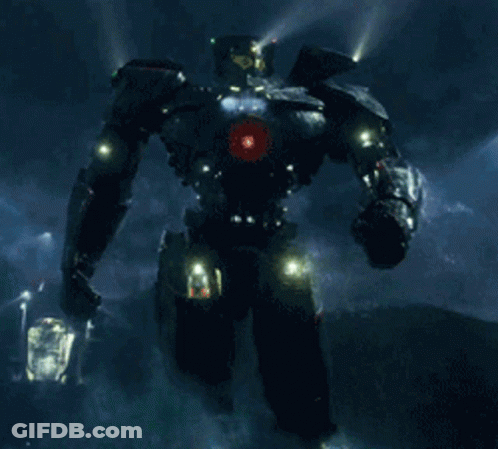 A Robot Is Standing In The Rain With A Red Light On Its Head GIF