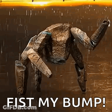 A Robot Is Standing In The Rain With The Words `` Fist My Bump '' Written On The Bottom . GIF
