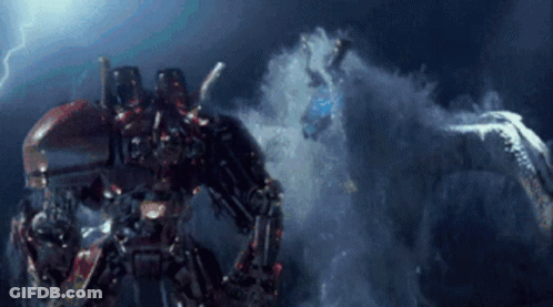 A Robot Is Standing In The Water With A Shark Behind Him GIF