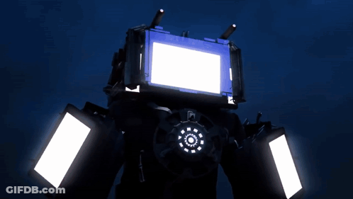 A Robot With A Blue Screen And White Lights GIF