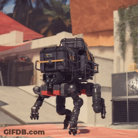 A Robot With A Briefcase On Its Back That Says ' A ' On It GIF