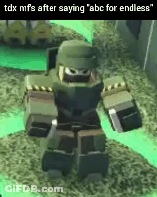 A Robot With A Helmet On Is Standing On A Grassy Field . GIF