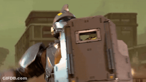 A Robot With A Shield That Says Aa On It GIF
