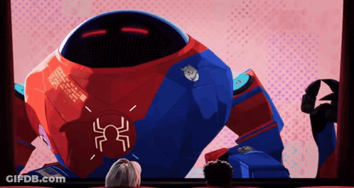A Robot With A Spider On It 'S Chest Is Being Shown On A Screen GIF