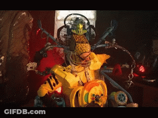 A Robot With A Yellow Shirt That Says ' Tiger ' On It 'S Chest GIF