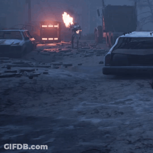 A Robot With Flames Coming Out Of It 'S Chest GIF
