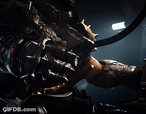 A Robot With Horns Is Standing In A Dark Room With A Light Shining On Him GIF