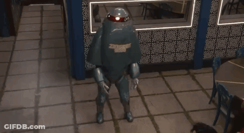 A Robot With The Word Zingbot Written On His Chest GIF