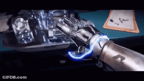 A Robotic Arm With A Blue Light Coming Out Of It 'S Hand . GIF