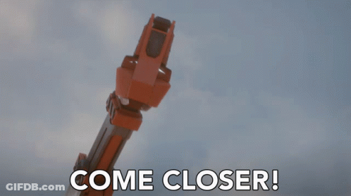 A Robotic Arm With The Words Come Closer Written On It GIF