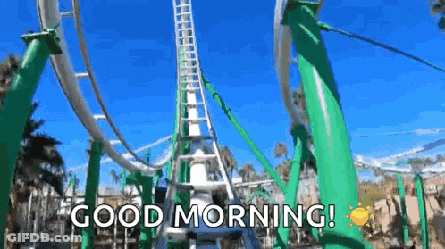 A Roller Coaster At A Theme Park With The Words `` Good Morning '' Written On It . GIF