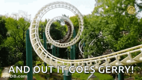 A Roller Coaster In A Theme Park With The Words `` And Out It Goes Gerry '' Written On It . GIF