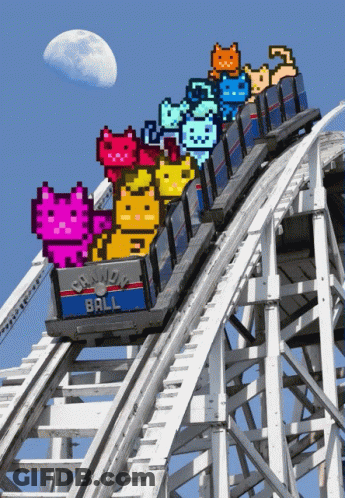 A Roller Coaster With A Sign That Says Grand Ball On It GIF