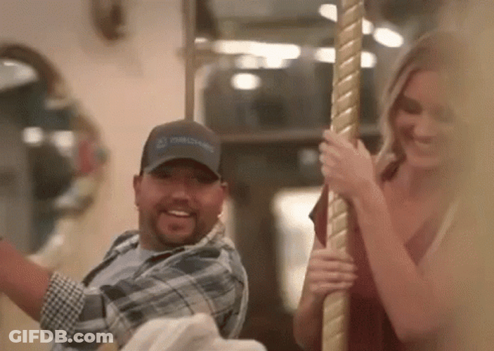 A Romantic Merry Go Round Ride GIF