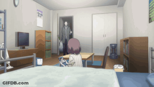 A Room With A Clock On The Wall That Says ' T ' On It GIF