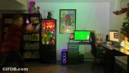 A Room With A Computer And A Green Screen GIF