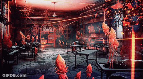 A Room With A Lot Of Plants And A Few Tables In It GIF