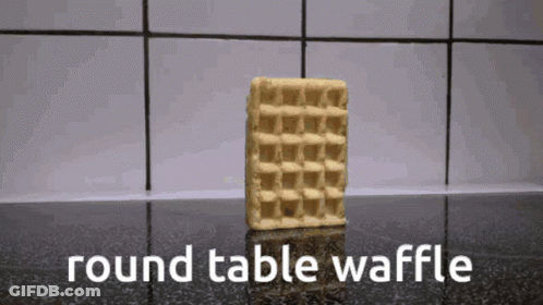 A Round Table Waffle Sits On A Counter Top GIF