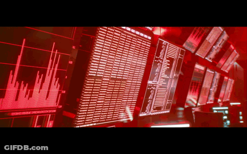 A Row Of Computer Monitors With One That Says ' U.s. ' On It GIF