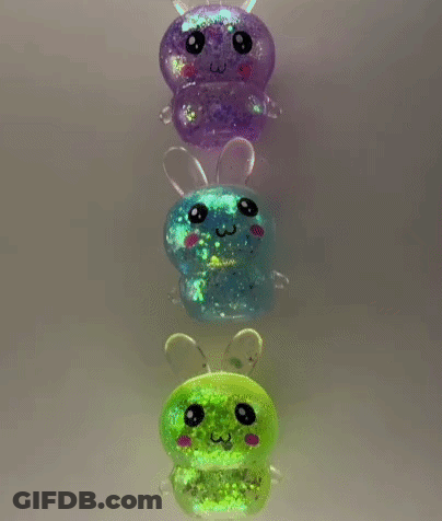 A Row Of Glow In The Dark Toys In The Shape Of A Bee . GIF