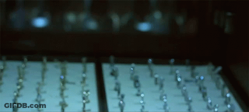 A Row Of Rings Are Displayed On A Table GIF