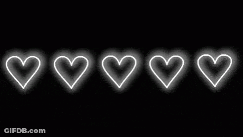 A Row Of White Hearts Glowing In The Dark On A Black Background . GIF