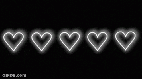 A Row Of White Hearts On A Black Background GIF
