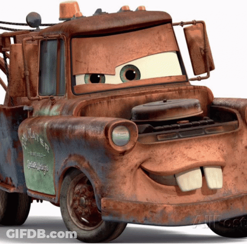 A Rusty Tow Truck With The Word Mater On The Side Of It GIF