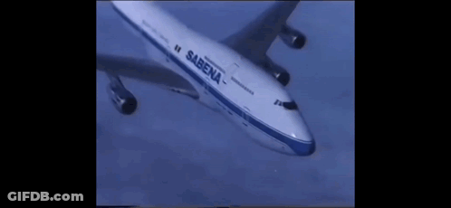 A Sabena Airplane Is Flying Through The Sky GIF