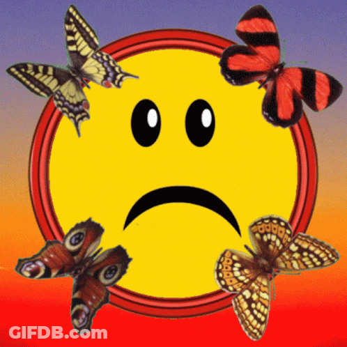 A Sad Face With Butterflies Around It GIF